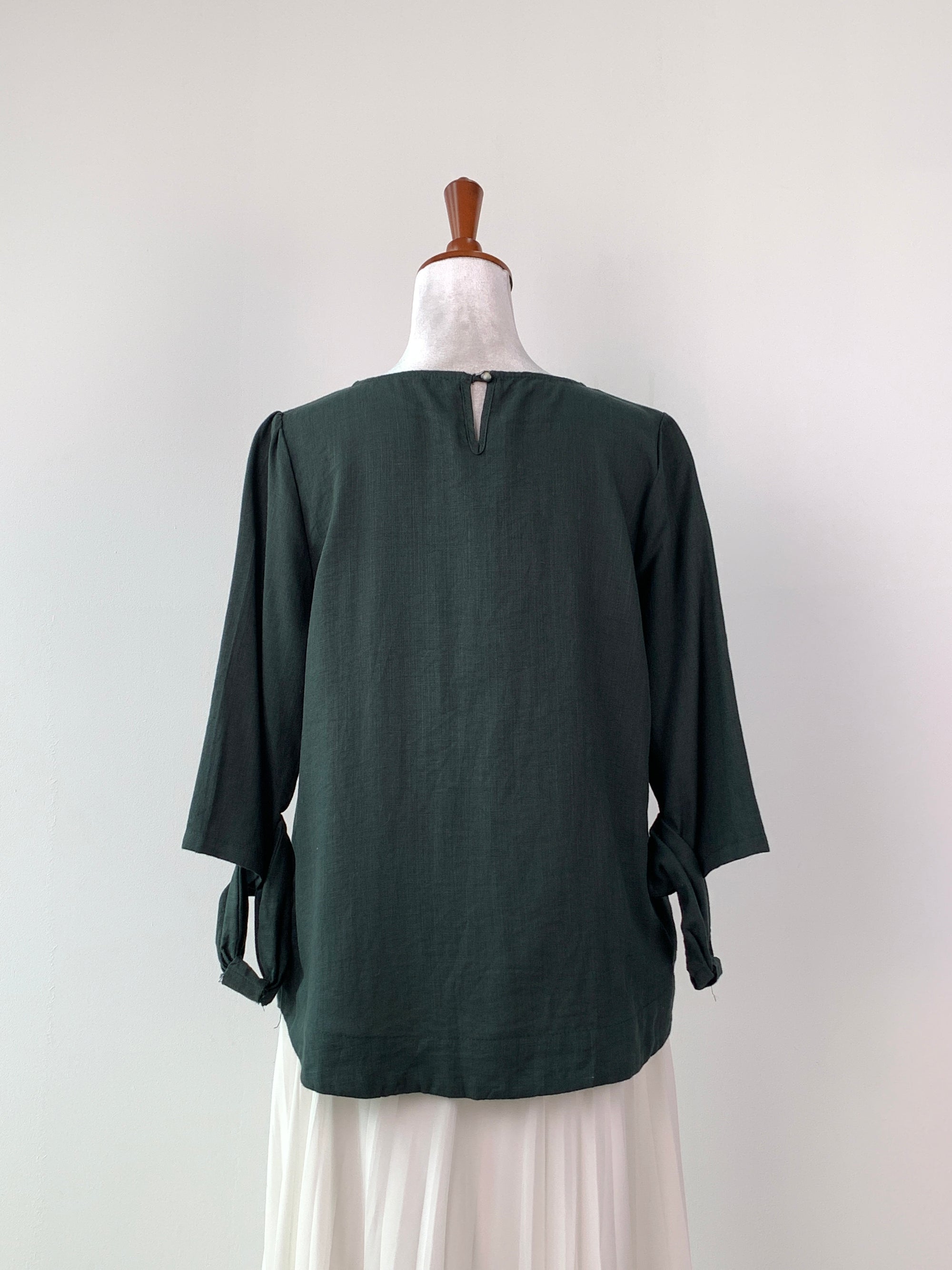 EMERALD GREEN